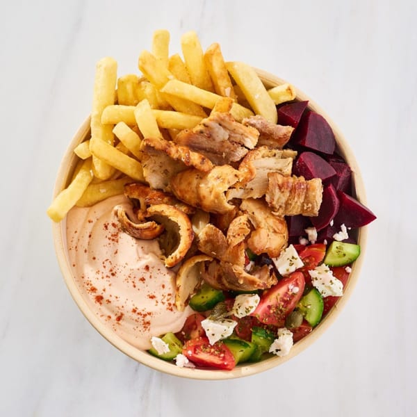 Gyro Concept's Greek bowl with chicken, fries, beetroot, tzatziki, and Greek salad.